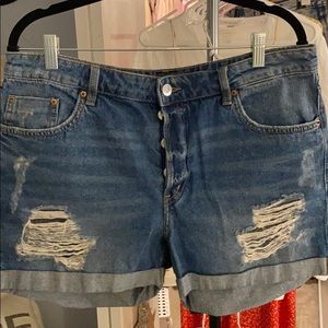 Distressed denim shorts